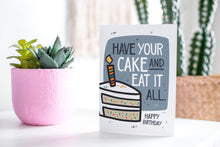 Load image into Gallery viewer,  A greeting card featured standing up on a white tabletop with a pink plant pot in the background and some succulents in the pot. There’s a woven basket in the background with a cactus inside. The card features the words “Have Your cake and eat it all, Happy birthday!” with an illustrated piece of cake with a candle on the top.