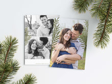 Load image into Gallery viewer, A photo of a Christmas card showing the front and back of the card laying on a white surface. Around the two sides of the card are pine needles. The front of the card features a photo and the words “Comfort in Joy, The Thompsons” in white over the photo. The back of the card features two photos.