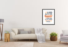 Load image into Gallery viewer, Artwork is featured on the wall of a living room above a white modern sofa. The artwork features hand drawn lettering of the Bible verse Numbers 6:24-26 reading &quot;The Lord bless you and keep you. The Lord make his face to shine on you and be gracious to you. The Lord turn his face toward you and give you peace.&quot;