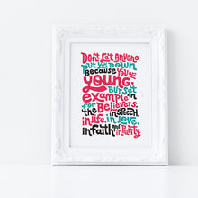 Load image into Gallery viewer, A print featured in a white frame with the lettering in red, blue and black. The Bible verse reads &quot;Don&#39;t let anyone put you down because you are young, but set an example for the believers, in speech, in life, in love, in faith and in purity.&quot;