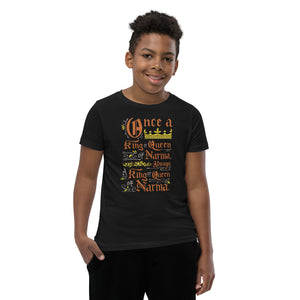A boy wearing a black short sleeved T-Shirt. The artwork features hand drawn lettering of the Narnia quote "Once a king or queen of Narnia, always a king or queen of Narnia."