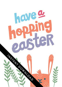 A close up of the card design with the words “instant download” over the top. The card features an illustrated Easter bunny with some leaves around the bunny. The words “have a hopping Easter” are above the bunny. 
