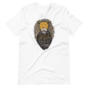 A white short sleeved T-Shirt on a white background. The T-Shirt features hand drawn illustration of the Chronicles of Narnia lion character Aslan. Inside the illustration there is the quote “At The Sound of Your Roar, Sorrows Will Be No More.”