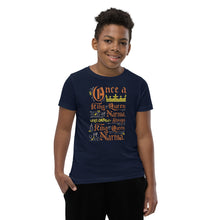 Load image into Gallery viewer, A boy wearing a navy short sleeved T-Shirt. The artwork features hand drawn lettering of the Narnia quote &quot;Once a king or queen of Narnia, always a king or queen of Narnia.&quot;