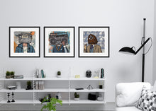 Load image into Gallery viewer, Three black framed prints hanging on a wall above a shelf. The artwork in the frames are three different vintage radios featured as &quot;heads&quot; on a person.