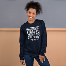 Load image into Gallery viewer, A woman wearing a navy sweatshirt featuring hand drawn lettering in white with the words &quot;Our creativity is an outflow of His.&quot;