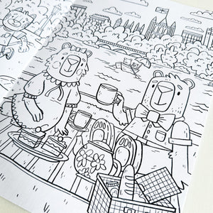 A close up of one of the colouring pages featuring with animals picnicking in Hyde Park.