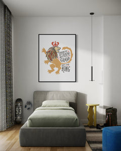 Artwork in a black frame with the with a white matte. The frame is hanging on a wall in a teen's bedroom. The artwork features an illustrated with the words "Course He Isn't Safe, But He's Good. He's the King."