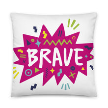 Load image into Gallery viewer, A pillow on a white background. The white pillow features the artwork on a white background with a hot pink star with the word &#39;brave&#39; inside and sketchy, fun elements around the word. 