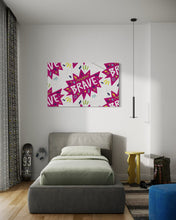 Load image into Gallery viewer, A large flag featured in a teen&#39;s bedroom above the bed. The white flag features a pattern with the word &quot;brave&quot; featured inside a pink star-like shape with sketchy illustrations around the word. 