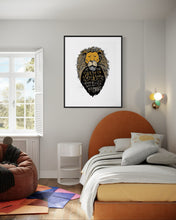 Load image into Gallery viewer, Artwork in a black frame with the with a white matte. The frame is on a wall above a teen&#39;s bed. The artwork features an illustrated Aslan (the lion from Chronicles of Narnia). Inside the lion the Narnia quote is featured reading “At The Sound of Your Roar, Sorrows Will Be No More.”