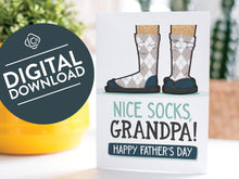 Load image into Gallery viewer, A greeting card is on a table top with a yellow plant pot and a green plant inside. The card features the words “Nice Socks Grandpa, Happy Father’s Day” with an illustrated of legs with patterned socks and shoes. The words &quot;digital download&quot; are featured in a circle on top of the image.