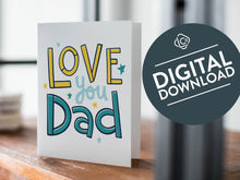 Load image into Gallery viewer, A card on a wood tabletop with an object in the background that is out of focus. The card features the words “Love you Dad” with small stars around the letters. The words &quot;digital download&quot; are featured in a circle on top of the image. 