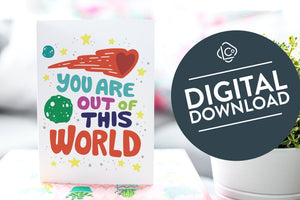 A greeting card is on a table top with a gift in pink wrapping paper. Next to the gift is a white plant pot with a green plant. The card features the words “You are out of this world” with space themed illustrations.. The words "digital download" are featured in a circle on top of the image. 