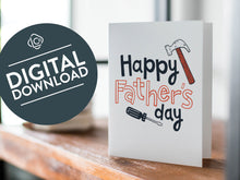 Load image into Gallery viewer, A card on a wood tabletop with an object in the background that is out of focus. The card features the words “Happy Father’s Day” with an illustrated hammer and screwdriver around the words. The words &quot;digital download&quot; are featured in a circle on top of the image. 