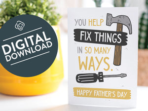 A greeting card is on a table top with a yellow plant pot and a green plant inside. The card features the words “You Help Fix Things in so Many Ways, Happy Father's Day” with an illustrated hammer and screwdriver around the words. The words "digital download" are featured in a circle on top of the image. 