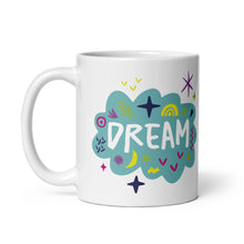 Load image into Gallery viewer, A white ceramic mug on a white background. The mug features a design with the word &#39;dream&#39; in an illustrated cloud with sketchy elements around it. 