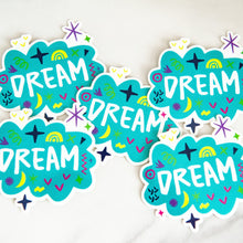 Load image into Gallery viewer, Vinyl die cut stickers with the word &quot;dream&quot; featured inside an illustrated cloud-shape with cute sketchy items around. 