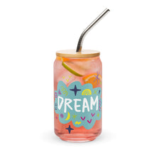 Load image into Gallery viewer, A photo of a glass can tumbler on a white background with a bamboo lid and silver metal straw. The design on the glass tumbler says the word &quot;dream&quot; inside a teal cloud illustration with sketchy illustrations around. 