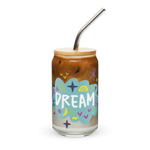 Load image into Gallery viewer, A photo of a glass can tumbler on a white background with a bamboo lid and silver metal straw. The design on the glass tumbler says the word &quot;dream&quot; inside a teal cloud illustration with sketchy illustrations around. 