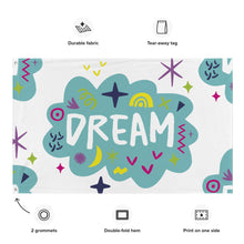 Load image into Gallery viewer, A large flag featured on a white background. The white flag features a pattern with the word &quot;dream&quot; featured inside a cloud with sketchy illustrations around the word.  Details of the flag are noted around the image reading &quot;durable fabric, tear-away tag, 2 grommets, double-fold hem, print on one side.&quot;