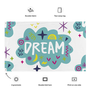 A large flag featured on a white background. The white flag features a pattern with the word "dream" featured inside a cloud with sketchy illustrations around the word.  Details of the flag are noted around the image reading "durable fabric, tear-away tag, 2 grommets, double-fold hem, print on one side."