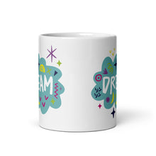 Load image into Gallery viewer, A side view of a white mug on a white background. The mug features a design with the word &#39;dream&#39; in an illustrated cloud with sketchy elements around it. 