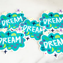 Load image into Gallery viewer, Vinyl die cut stickers with the word &quot;dream&quot; featured inside an illustrated cloud-shape with cute sketchy items around. 