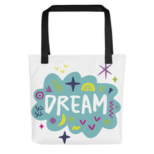 Load image into Gallery viewer, A white tote bag with black handles on a white background. The bag features a design with the word &#39;dream&#39; with an illustrated cloud around the word with colorful sketchy around. 