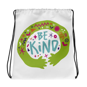 A white drawstring bag on a white background. The drawstring bag has a the words "Be Kind" with green illustrated hands hugging the design with sketchy illustrations. 