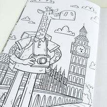 Load image into Gallery viewer, A close up of one of the colouring pages featuring a giraffe in front of Big Ben.