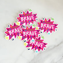 Load image into Gallery viewer, Vinyl die cut stickers with the word &quot;brave&quot; featured inside a pink star-like shape with fun sketchy elements around it. 