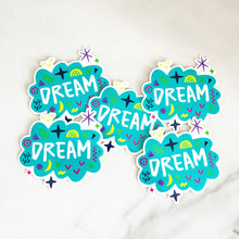 Load image into Gallery viewer, Vinyl die cut stickers with the word &quot;dream&quot; featured inside an illustrated cloud-shape with cute sketchy items around. 