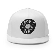 Load image into Gallery viewer, A white trucker hat on a white background. The hat features an black embroidered design with an illustrated vinyl record and the words &#39;good vibes&#39; inside.  