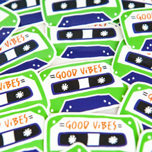 Load image into Gallery viewer, Vinyl die cut stickers with the words &quot;good vibes&quot; inside an illustrated cassette tape. 