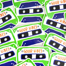 Load image into Gallery viewer, Vinyl die cut stickers with the words &quot;good vibes&quot; inside an illustrated cassette tape. 