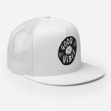 Load image into Gallery viewer, A white trucker hat on a white background showing an angel view of the hat. The hat features an black embroidered design with an illustrated vinyl record and the words &#39;good vibes&#39; inside.  