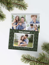 Load image into Gallery viewer, A photo of a Christmas card showing the front and back of the card laying on a white surface. Around the two sides of the card are pine needles. The front of the card features a photo with a frame around it with illustrated pine trees. Above the photo reads “Merry Christmas” and below the photo you can add your family name. The back of the card features three photos with illustrated pine trees. 