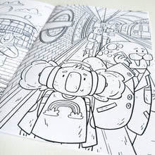 Load image into Gallery viewer, A close up one of the colouring pages featuring a koala on a tube platform.