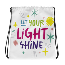 Load image into Gallery viewer, A white drawstring bag on a white background. The drawstring bag has the words &quot;Let Your Light Shine&quot; with sketchy illustrations around the words.