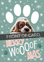 Load image into Gallery viewer, A close up of the front of the card showing the front of the card design. Across the image is a gray strip with the words “front of card” on it. The front of the card features a photo inside a paw shaped frame. Around the photo are white stars and below are the words “Merry Woofmas.” 