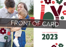 Load image into Gallery viewer, A close up of the front of the card showing the front of the card design. Across the image is a gray strip with the words “front of card” on it. The front of the card features a photo to the left side and to the right side the word “Joy” is featured in a fun, modern font with modern illustrated flowers around it. Below the word is the option to put your family name and the year 2023. 