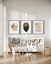 Load image into Gallery viewer, A set of three artwork prints hanging on a wall above a crib in a nursery. The artwork is inspired by the Chronicles of Narnia. The first print reads &quot;Course He Isn&#39;t Safe, But He&#39;s Good. He&#39;s the King.&quot; The second print reads &quot;At The Sound of Your Roar, Sorrows Will Be No More,&quot; and the last print reads &quot;Once a king or queen of Narnia, always a king or queen of Narnia.&quot;