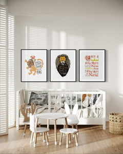 A set of three artwork prints hanging on a wall above a crib in a nursery. The artwork is inspired by the Chronicles of Narnia. The first print reads "Course He Isn't Safe, But He's Good. He's the King." The second print reads "At The Sound of Your Roar, Sorrows Will Be No More," and the last print reads "Once a king or queen of Narnia, always a king or queen of Narnia."