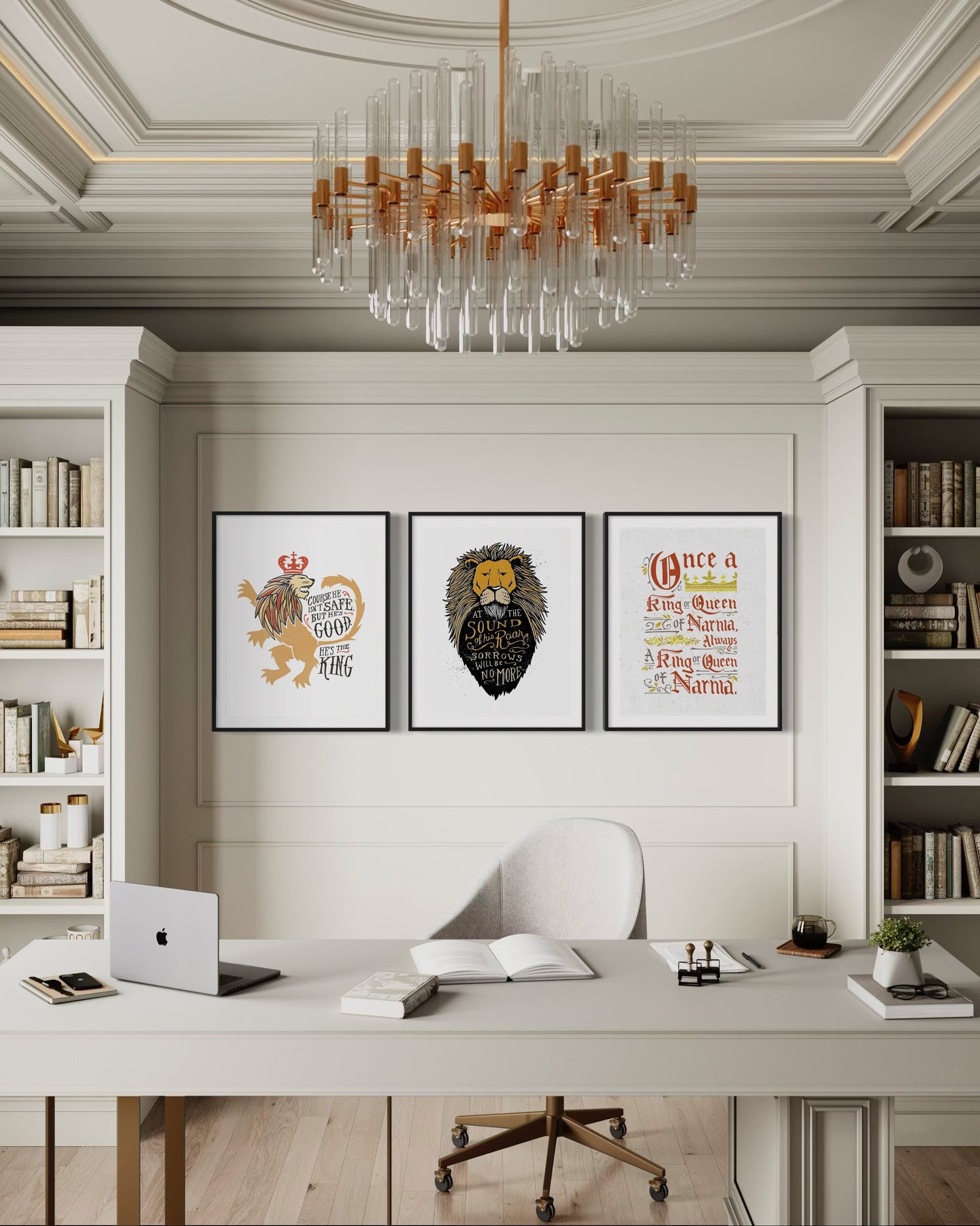 A set of three artwork prints hanging on a wall of an office. The artwork is inspired by the Chronicles of Narnia. The first print reads 