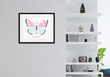 Load image into Gallery viewer, Artwork featured on a wall in a black frame by a shelving unit. The hand drawn artwork features the scripture verse &quot;Therefore, if anyone is in Christ, the new creation has come. The old has gone. The new is here.&quot; The words are featured inside a butterfly. 