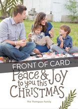 Load image into Gallery viewer, A close up of the front of the card showing the front of the card design. Across the image is a gray strip with the words “front of card” on it. The front of the card features a photo on the top portion and the words “Peace &amp; Joy to You This Christmas” with space to put your family name below. 