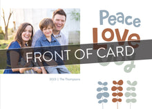 Load image into Gallery viewer, A close up of the front of the card showing the front of the card design. Across the image is a gray strip with the words “front of card” on it. The front of the card features a photo on the left side with the words “Peace Love Joy” with modern illustrated leaves below. 