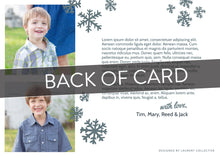 Load image into Gallery viewer, A close up of the back of the card showing the two photos and design features. Across the image is a gray strip with the words “back of card” on it. The back of the card features two photos, illustrated snowflakes and a place to add a family update. 