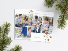 Load image into Gallery viewer, A photo of a Christmas card showing the front and back of the card laying on a white surface. Around the two sides of the card are pine needles. The front of the card features two photos with the words “Peace. Love. Joy.” above the photos. Below the photos are colored stars and a place where you can put your family name. The back of the card features three photos and colored stars. 